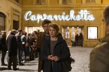 Cinema with Wings Of Desire poster in Mia Madre: "You could say that he is a projection of Margherita."